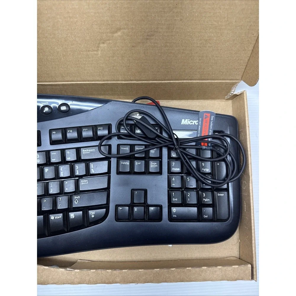 Microsoft Comfort Curve Keyboard 2000 Ergonomic Wired USB Black Model 1047